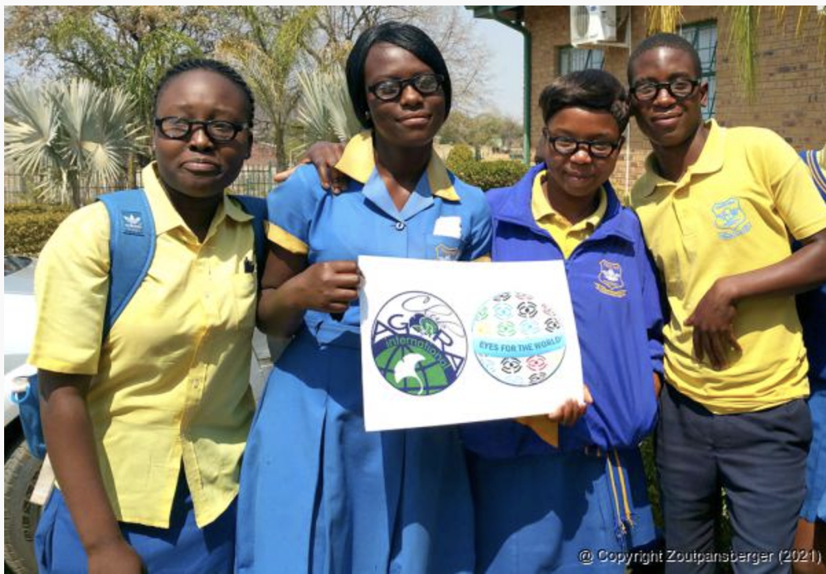 More local children benefitted from the Eyes for the World (EFTW) project last week, when the EFTW team and ladies from Agora visited the Tshiitwa Secondary School and Ozias Davhana School. Proudly displaying their new Focusspecs, while displaying Agora’s international Eyes for the World support project and EFTW logo, are four learners from Tshiitwa school. Photo supplied. 